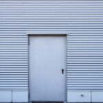 corrugated metal building with door