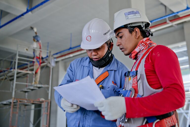 Houston design build professionals working together on construction site