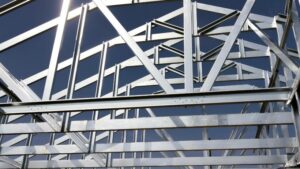 Steel frame of shell structure against blue sky built by Houston industrial construction