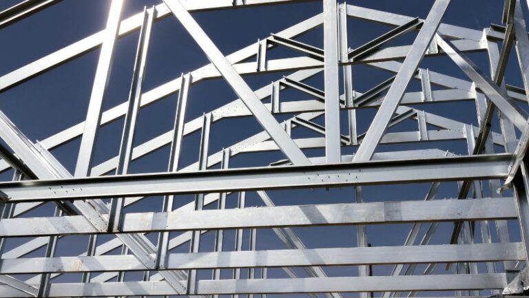 Steel frame of shell structure against blue sky built by Houston industrial construction