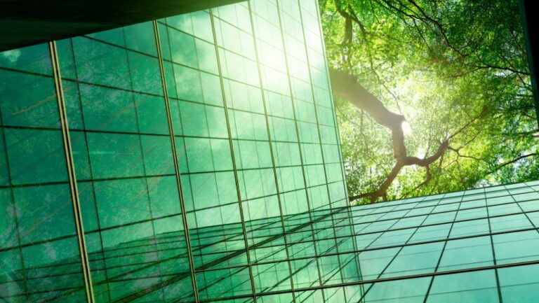 green building built by Houston commercial construction