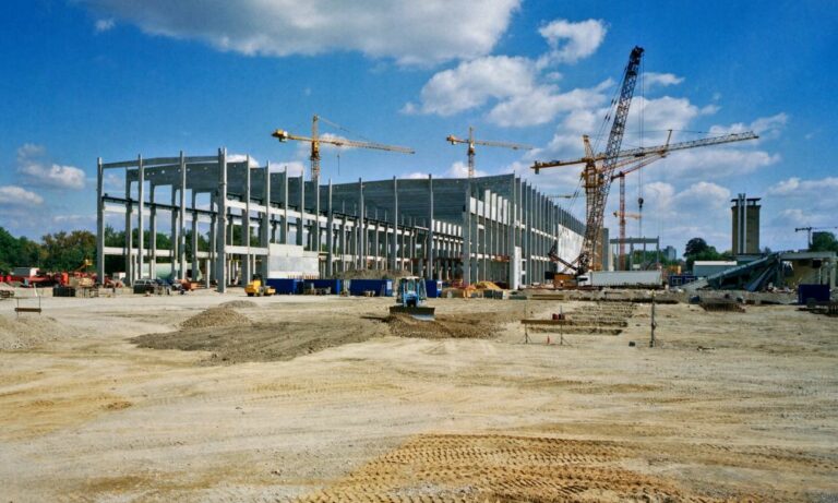 Houston commercial construction site in progress with crane and equipment